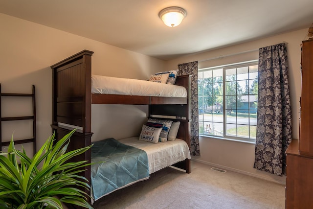 772 Cedar St, Whitefish, MT 59937 - bedroom with multiple windows, carpet, and baseboards