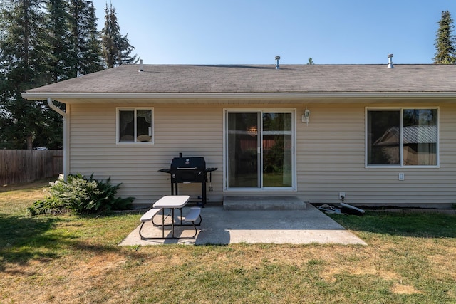 772 Cedar St, Whitefish, MT 59937 - rear view of property featuring a patio area and a shingled roof