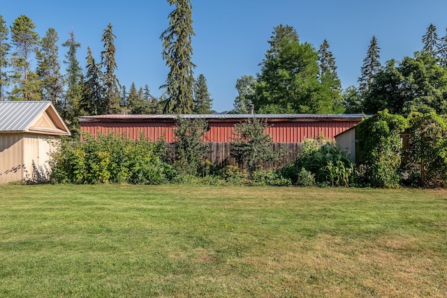 772 Cedar St, Whitefish, MT 59937 - view of grassy yard featuring an outdoor structure