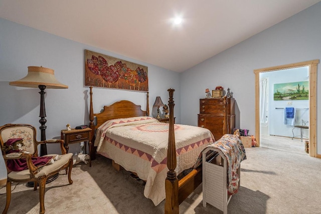 bedroom featuring light carpet and lofted ceiling