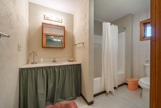 full bathroom featuring tile flooring, large vanity, toilet, and shower / bathtub combination with curtain