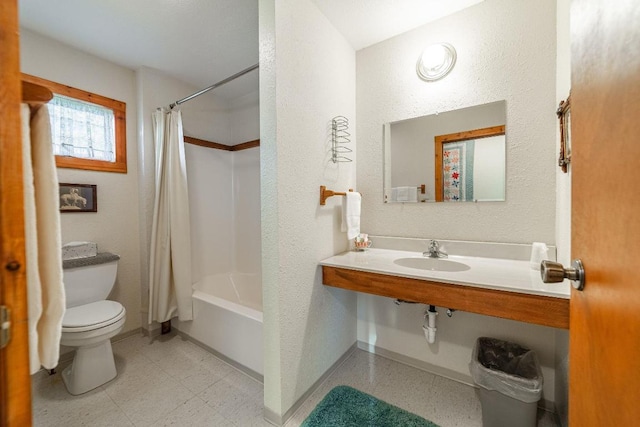 full bathroom with toilet, shower / tub combo, sink, and tile flooring