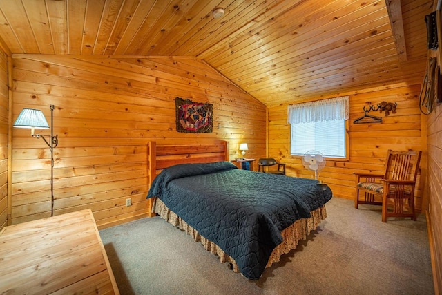 bedroom featuring vaulted ceiling, carpet flooring, and wood ceiling