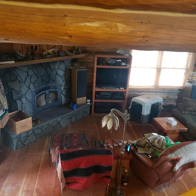 living room featuring a fireplace and dark hardwood / wood-style floors