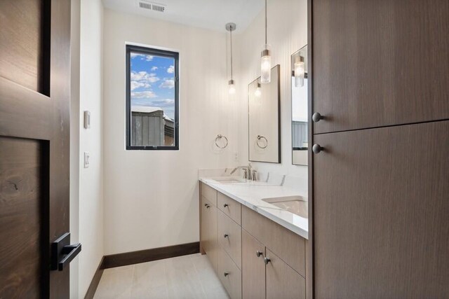 bathroom featuring vanity and tile patterned floors