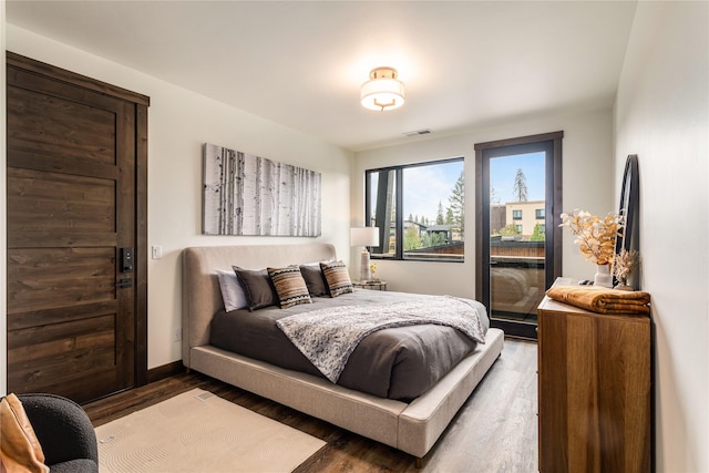 bedroom with wood-type flooring