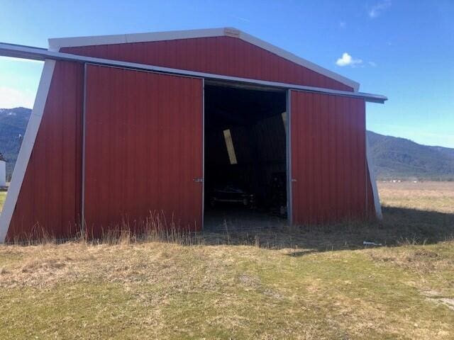 view of outdoor structure with a mountain view