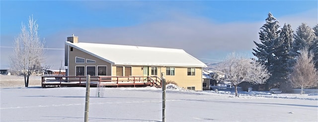 view of front of home featuring a wooden deck