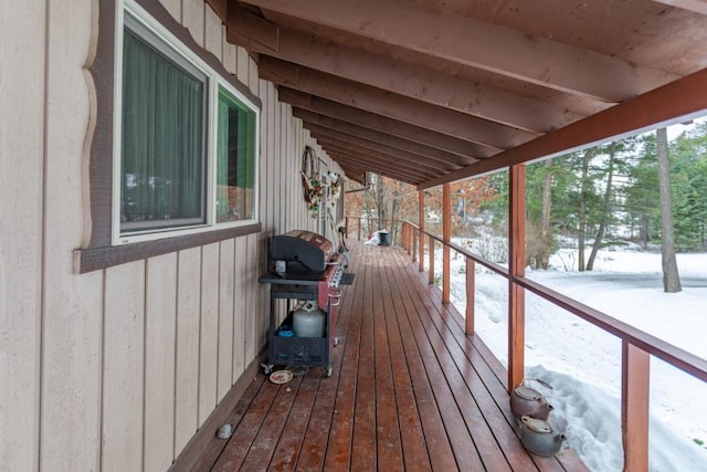 view of snow covered deck