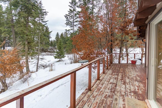 view of snow covered deck