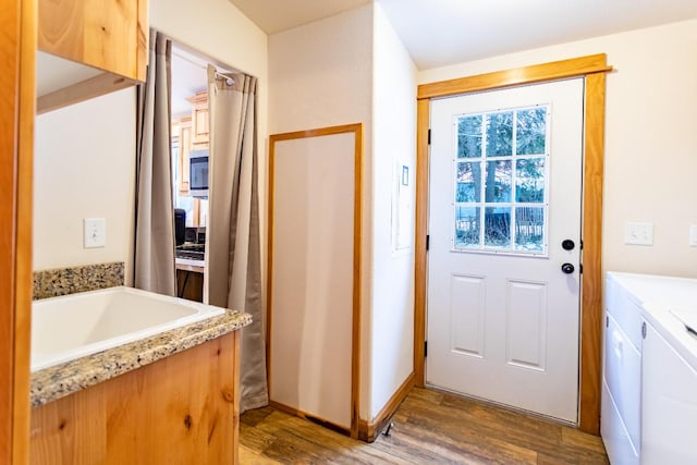 interior space with sink and dark hardwood / wood-style flooring