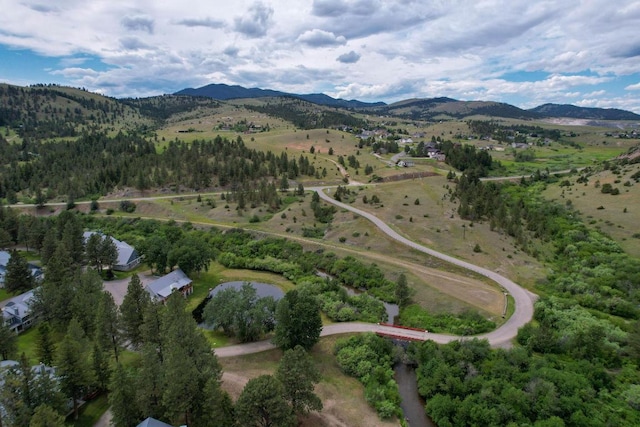 drone / aerial view featuring a mountain view