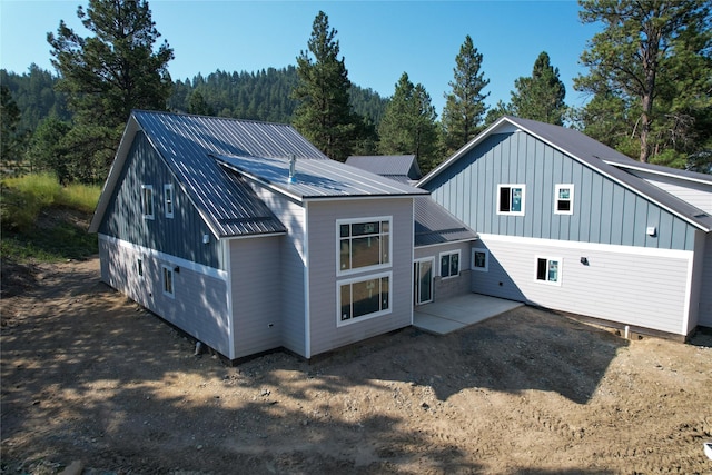 back of house featuring a patio area