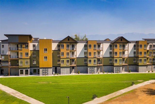 view of building exterior featuring a mountain view