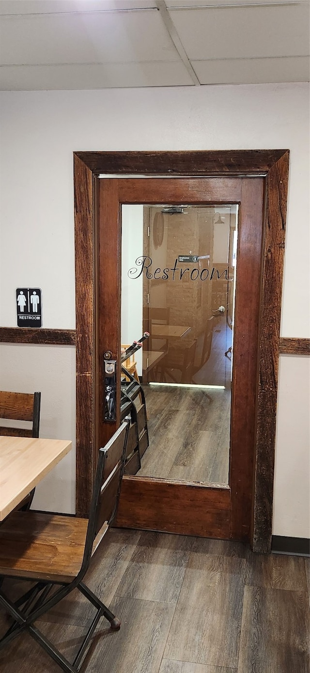 hall with dark hardwood / wood-style floors