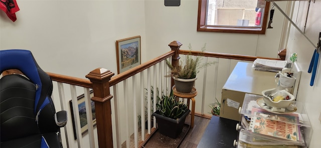 stairs with dark hardwood / wood-style flooring