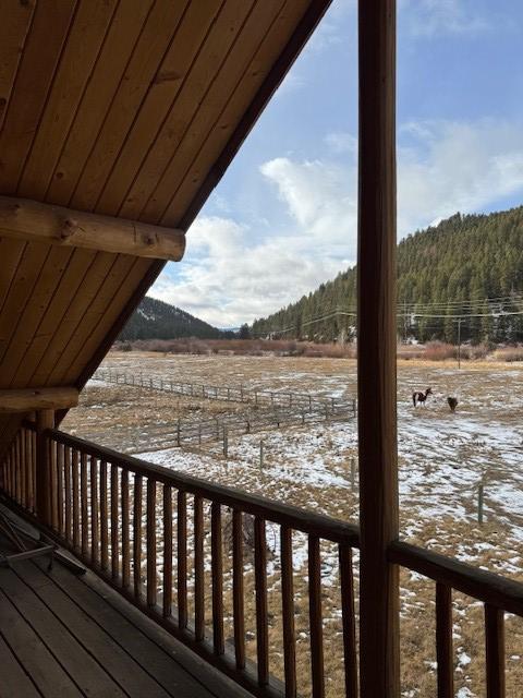 view of snow covered deck