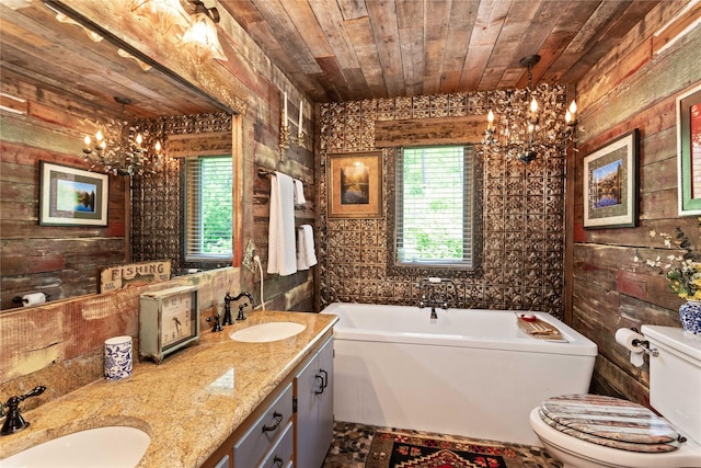 bathroom featuring vanity, toilet, a notable chandelier, wood ceiling, and a tub