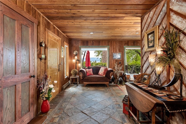 sunroom / solarium with vaulted ceiling and wood ceiling