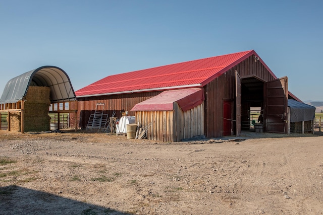 view of stable with an outdoor structure