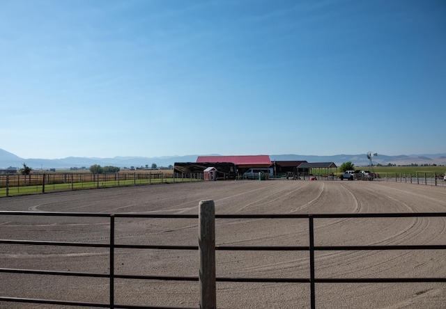 exterior space with a mountain view and a rural view