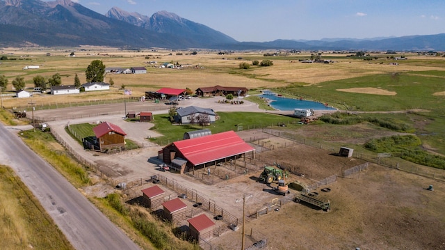 bird's eye view with a mountain view and a rural view