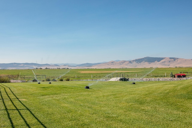 property view of mountains featuring a rural view