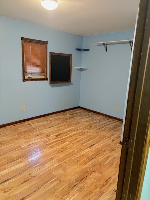 empty room featuring light hardwood / wood-style floors