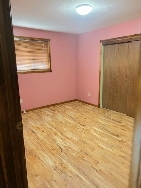 unfurnished bedroom featuring light hardwood / wood-style floors