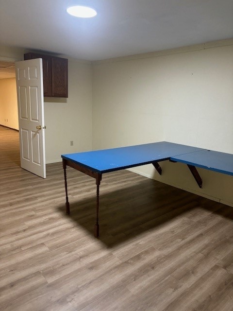 playroom with light wood-type flooring