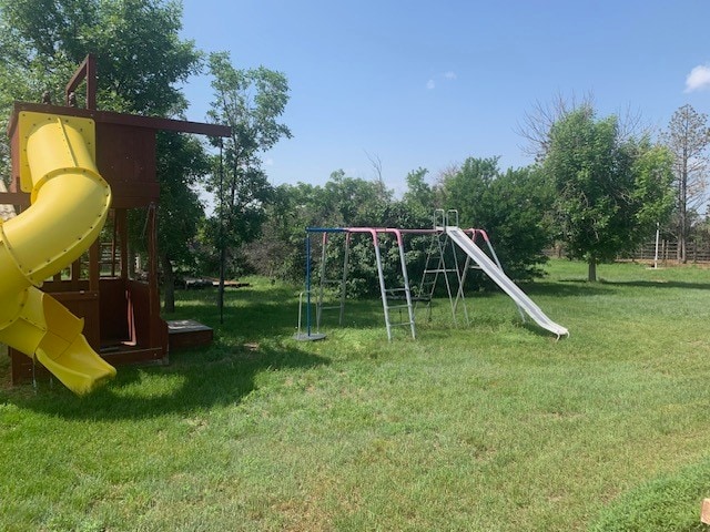 view of play area with a yard