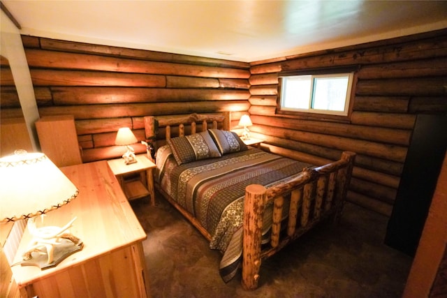 bedroom featuring log walls