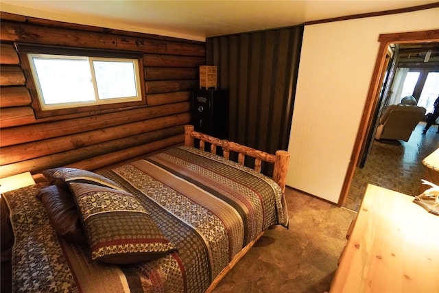 carpeted bedroom with log walls