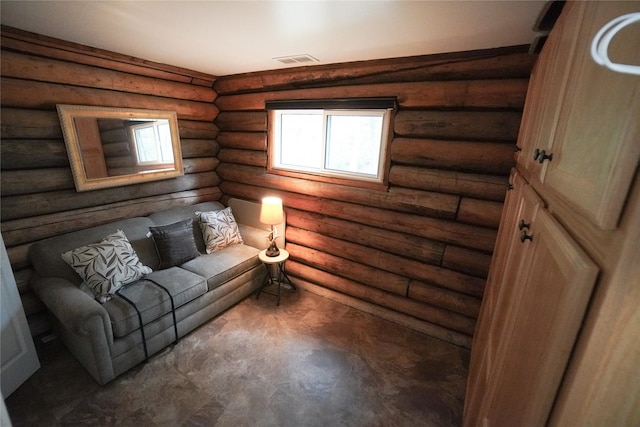 living room featuring rustic walls