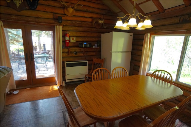 dining area with french doors, heating unit, a chandelier, high vaulted ceiling, and beam ceiling