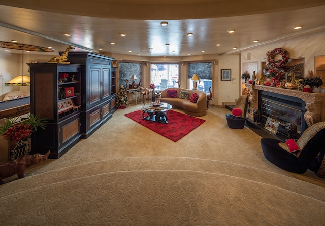 carpeted living room featuring crown molding