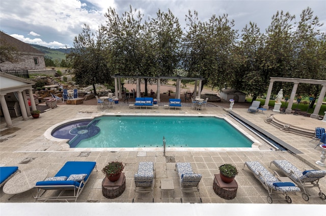 view of pool with a patio