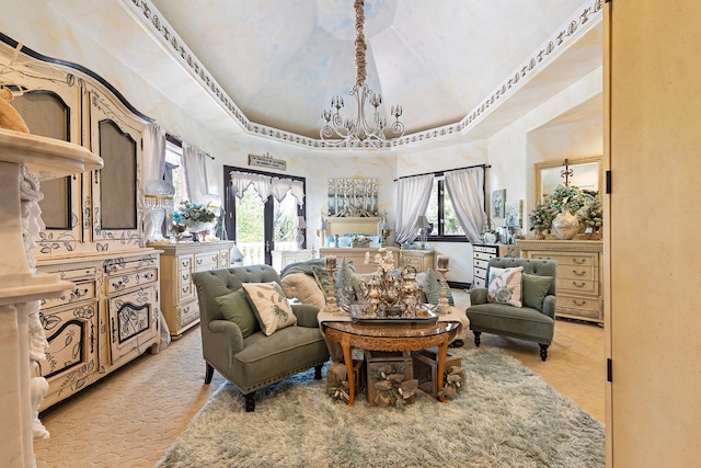 living room featuring a chandelier, light colored carpet, and a wealth of natural light