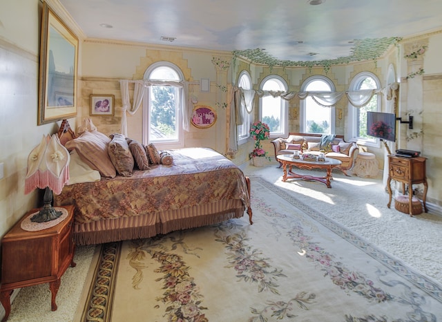 bedroom with ornamental molding