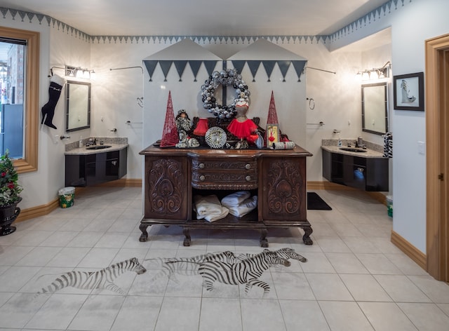 interior space with sink and light tile flooring