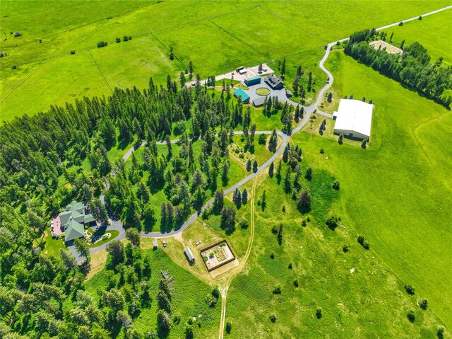 birds eye view of property featuring a water and mountain view