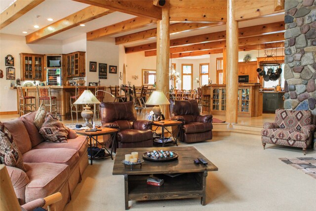 playroom with a stone fireplace, beamed ceiling, billiards, and light wood-type flooring