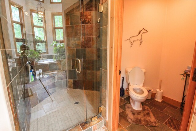 bathroom featuring vanity and an enclosed shower