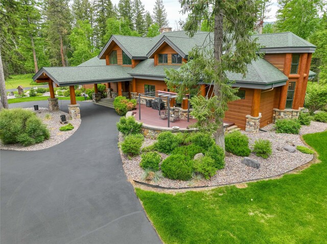 rear view of property with a patio area