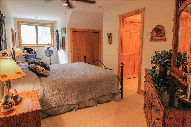 bedroom featuring a spacious closet and light tile patterned floors