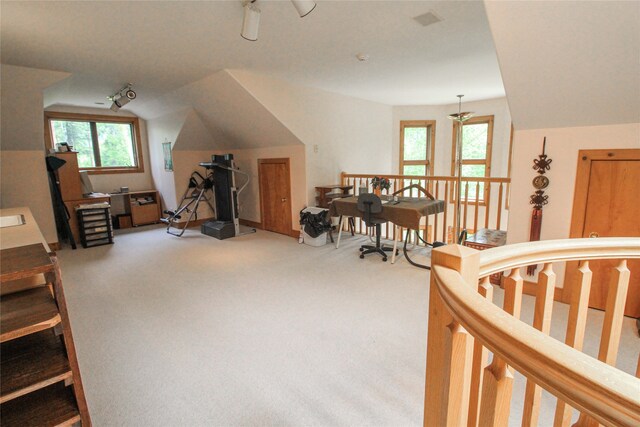 bedroom featuring light carpet and ceiling fan