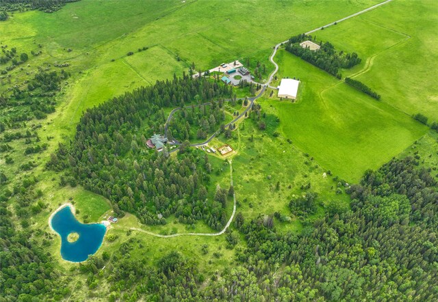 aerial view featuring a mountain view and a rural view