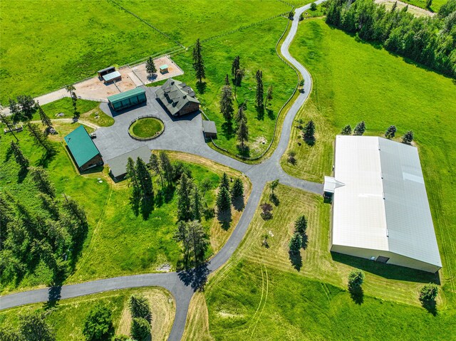 birds eye view of property featuring a water and mountain view