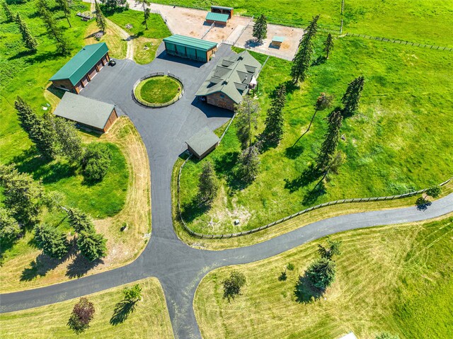 birds eye view of property featuring a mountain view