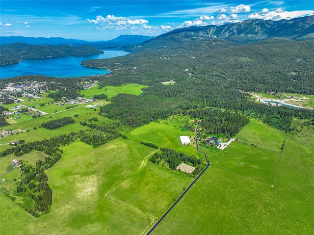 aerial view with a water and mountain view